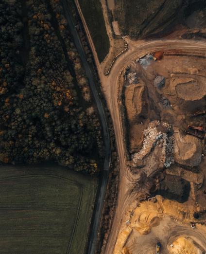 Landfill and Aggregates Mine Located Close to Farmland and Forest
